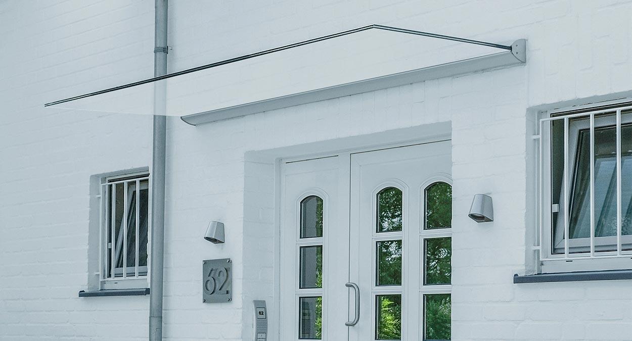 Vordach aus Glas für Haustür - Eingangsüberdachung aus Glas